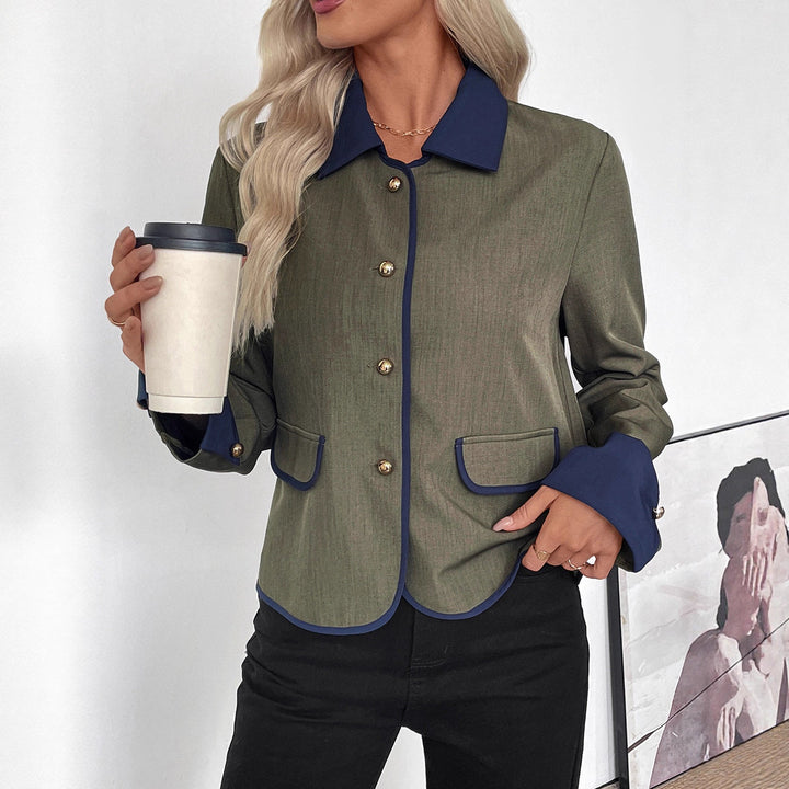 Ladies short blazer with contrasting piping, lapel collar and decorative buttons Mune Fashion