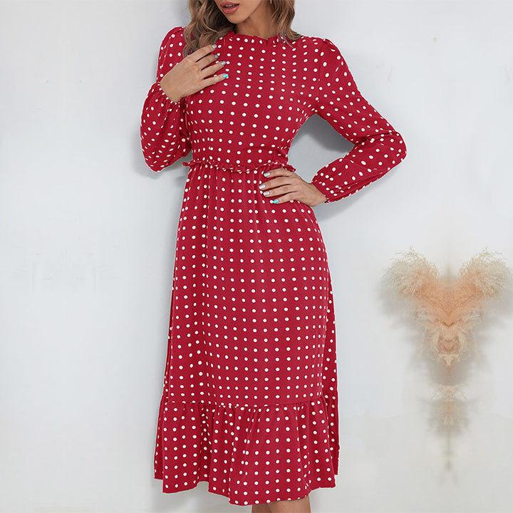 Women's midi dress in retro polka dot style with stand-up collar, tailored gathering, and ruffle trim
