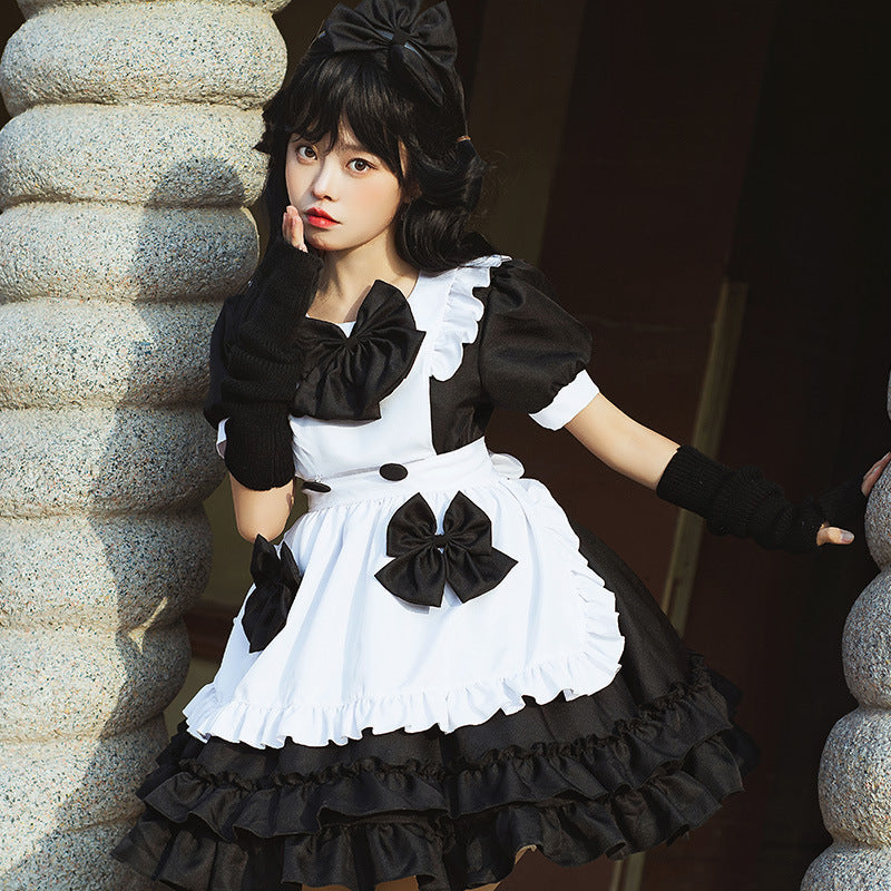 Ladies playful costume dress with ruffle details Mune Fashion