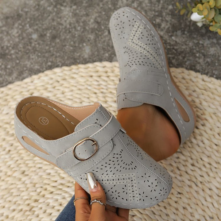 Women Breathable Faux Leather Mules with Ergonomic Comfort Footbed and Decorative Cut Mune Fashion