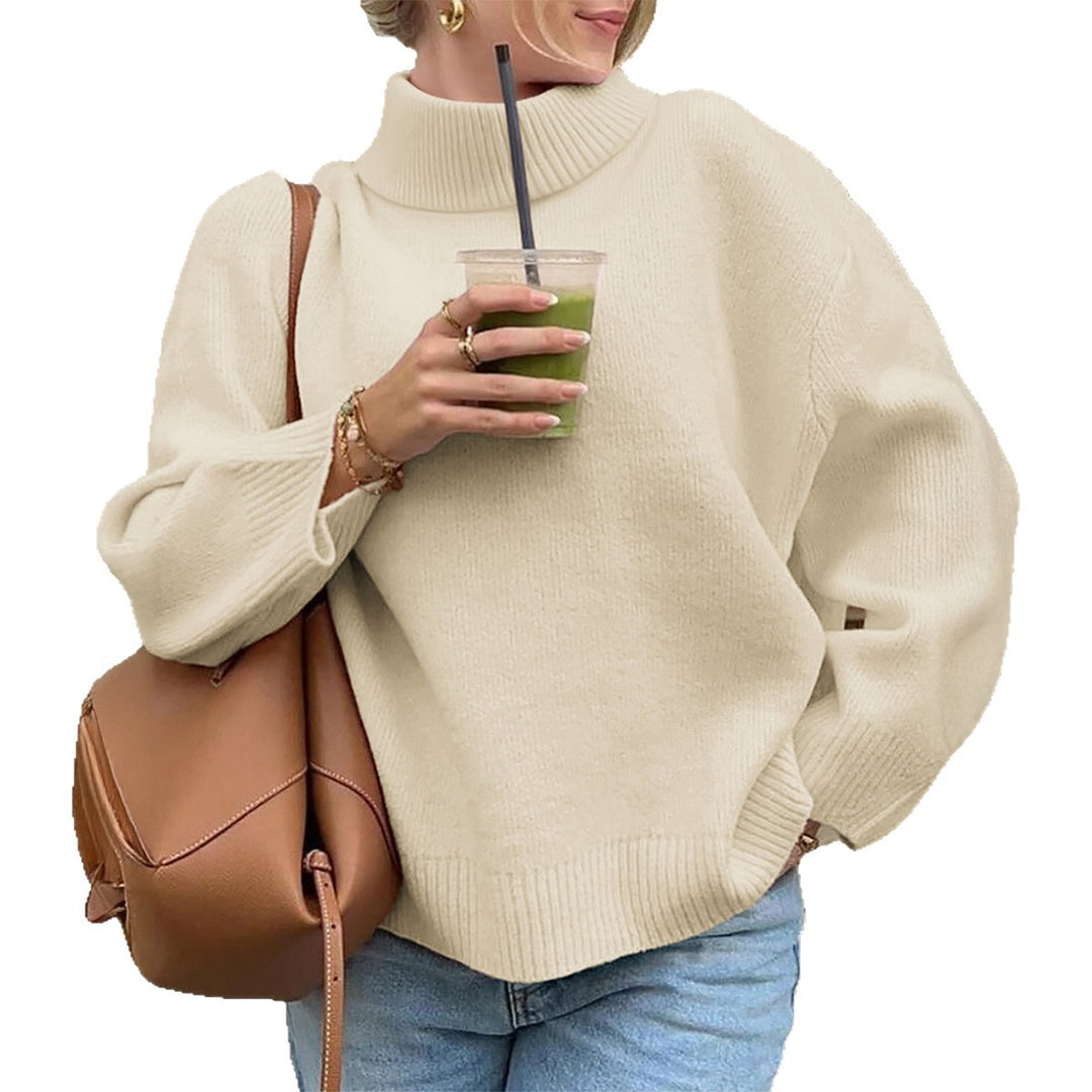 Women's oversized turtleneck sweater with wide ribbed collar, voluminous balloon sleeves, and extended cuffs Mune Fashion