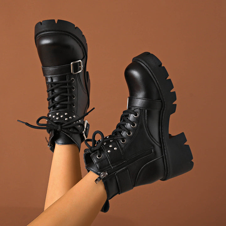 Women's rugged lace-up biker boots with decorative studded straps, side zipper, and textured platform sole Mune Fashion