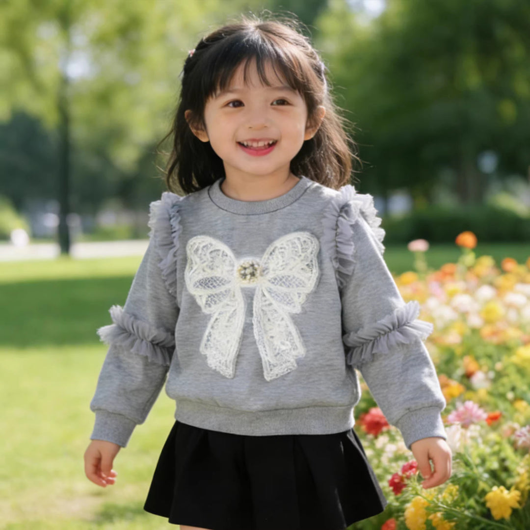 Girl sweatshirt with ruffle details and decorative bow motif Mune Fashion