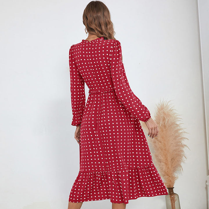 Women's midi dress in retro polka dot style with stand-up collar, tailored gathering, and ruffle trim