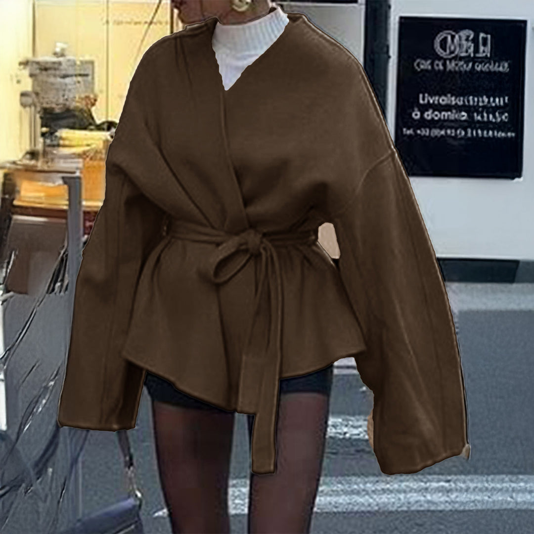 Women’s light wrap coat with tie belt, dropped sleeves and feminine waist emphasis Mune Fashion