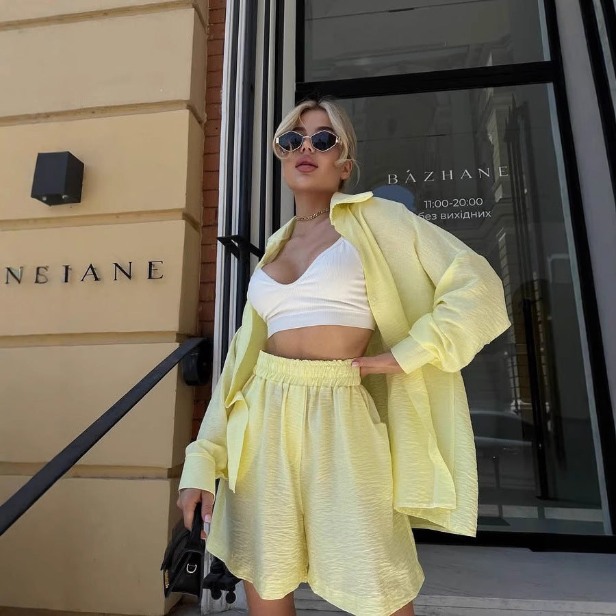 Women's two-piece textured loungewear set with oversized shirt and elastic waist shorts Mune Fashion