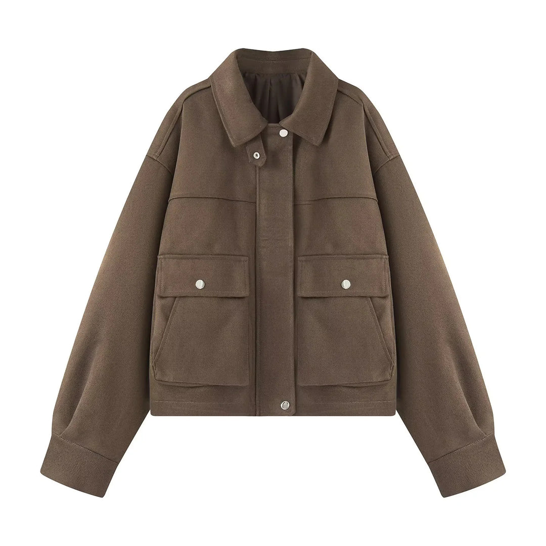 Women's boxy short utility jacket with large flap pockets, snap button placket, and drop shoulder Mune Fashion