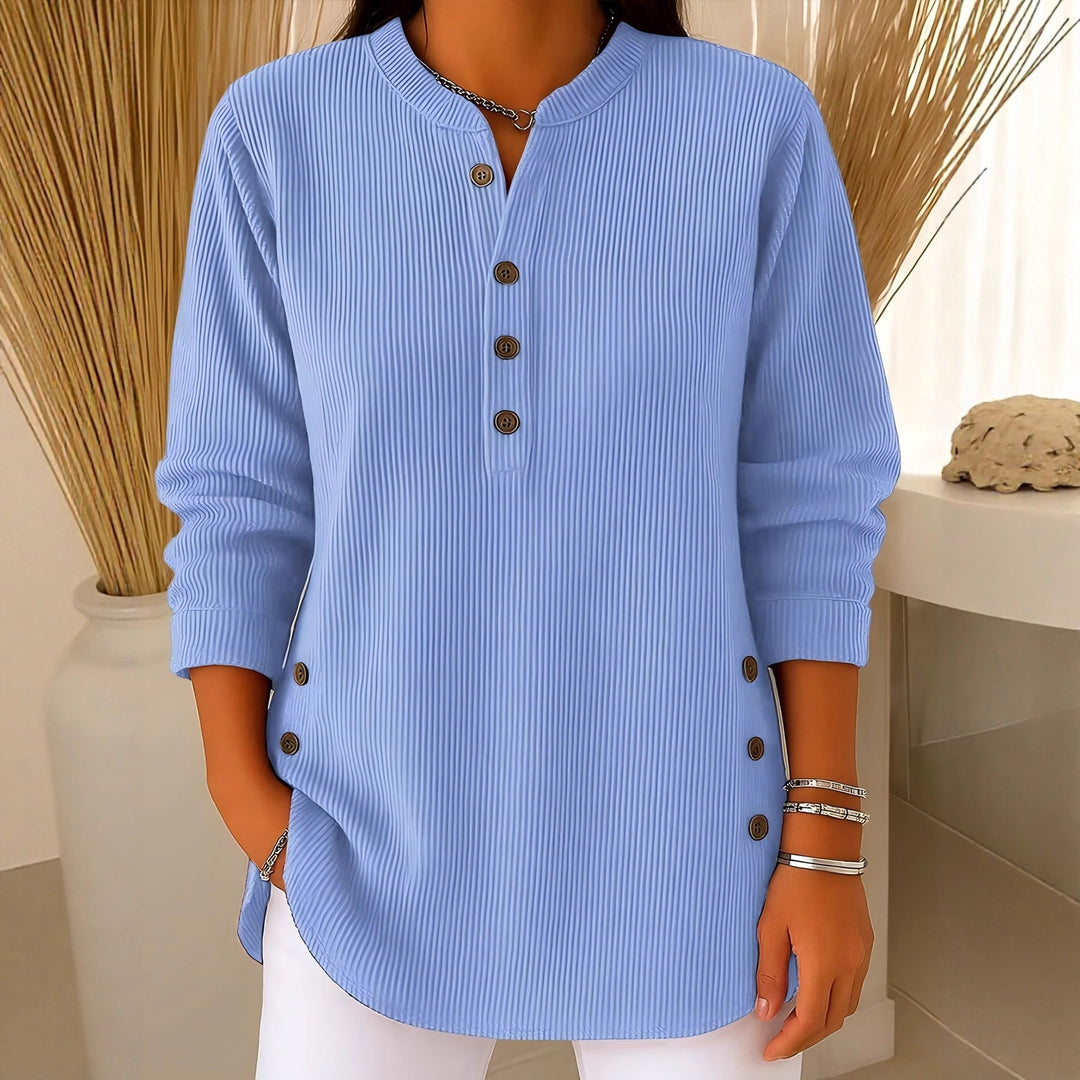 Women's plisse tunic blouse with stand-up collar, button placket and side decorative buttons Mune Fashion