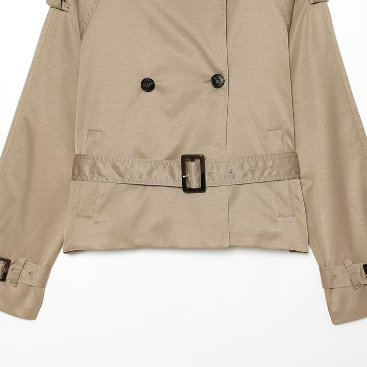 Ladies short tailored trench coat in cape look with high funnel collar and buckle cuffs Mune Fashion