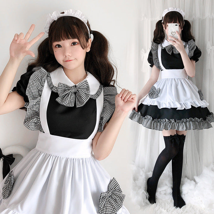 Ladies playful maid dress with ruffle details and bows Mune Fashion