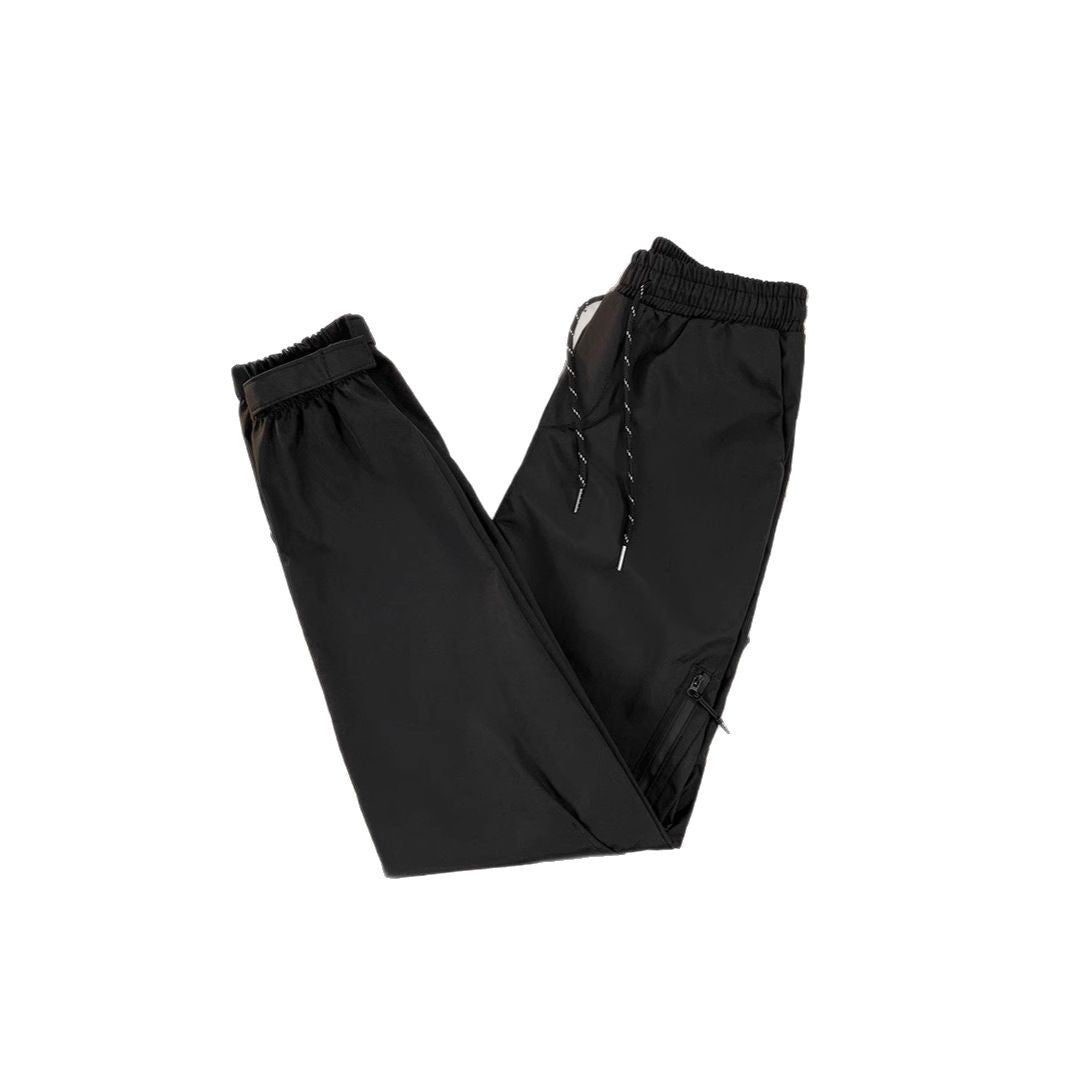 Unisex sporty jogging pants with adjustable waistband and side pockets Mune Fashion