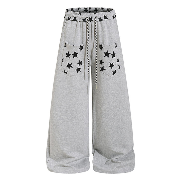 Women's extra wide palazzo sweatpants with comfort waistband, drawstring and star appliqué Mune Fashion