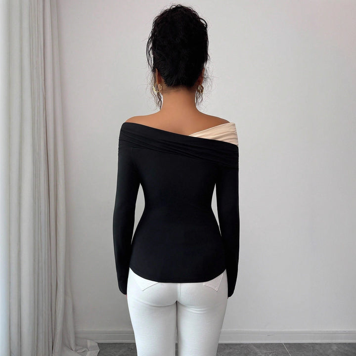 Women’s asymmetrical Carmen top with shoulder gathering and body-hugging jersey fit Mune Fashion