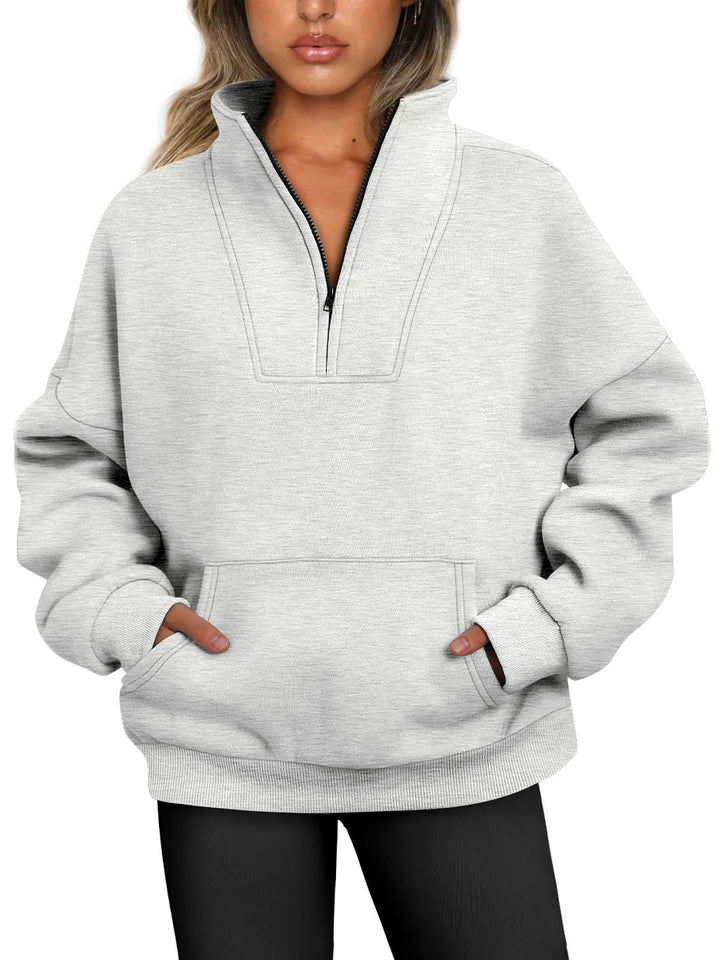 Women's oversized half-zip hoodie with high stand collar, kangaroo pocket, and ribbed cuffs Mune Fashion