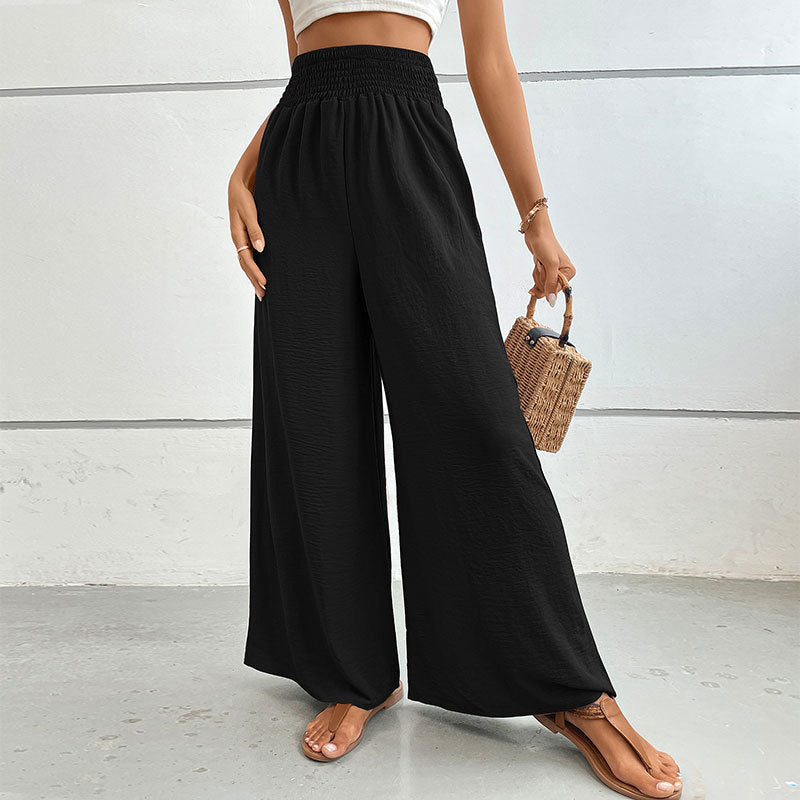 Women's palazzo pants with a high, elastic ruffled waistband and side pockets Mune Fashion