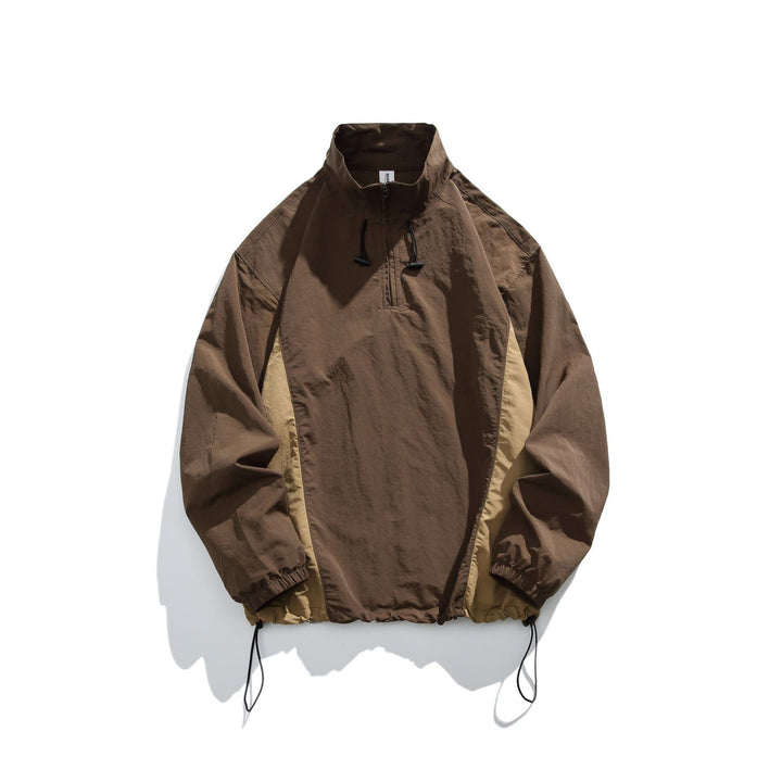 Men's lightweight nylon anorak with half-zip, drawstring hem, and raglan sleeves Mune Fashion