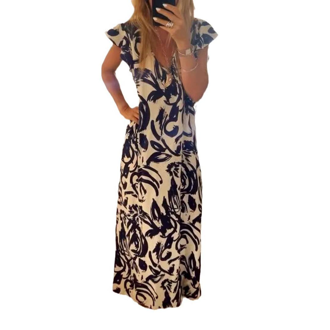 Women's flowing maxi dress with V-neck, flutter sleeves, and side leg slit Mune Fashion