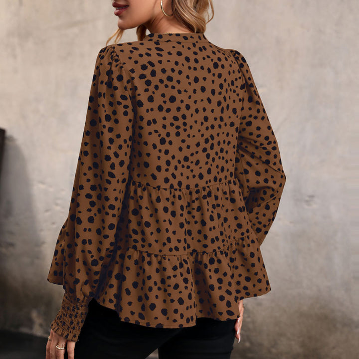 Ladies V neck tunic with tiered hem, smocked cuffs and polka dot all-over print Mune Fashion