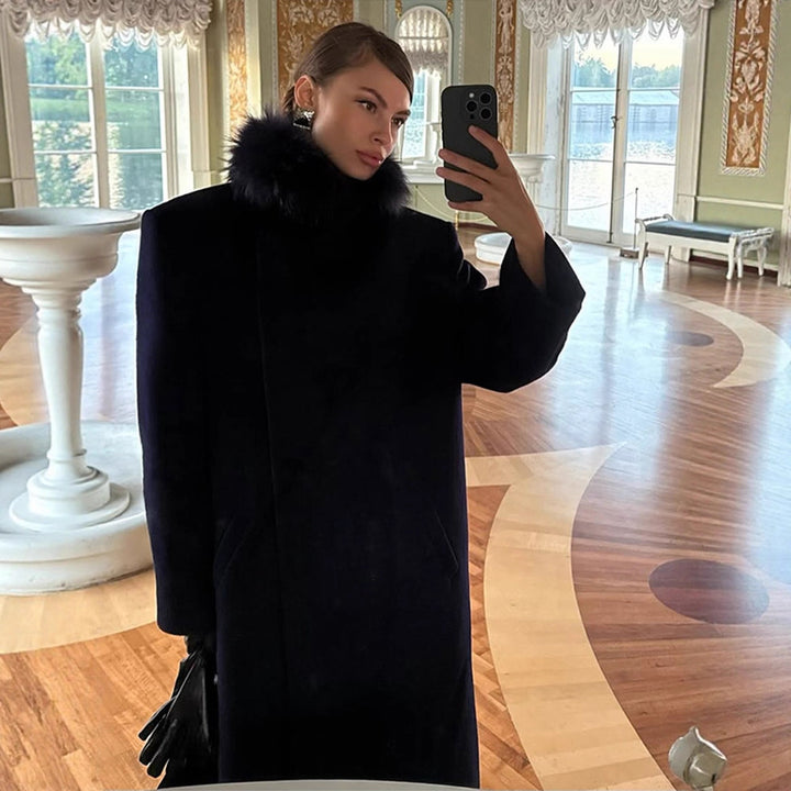 Women's long wool blend coat with generous faux fur shawl collar and oversized cut Mune Fashion