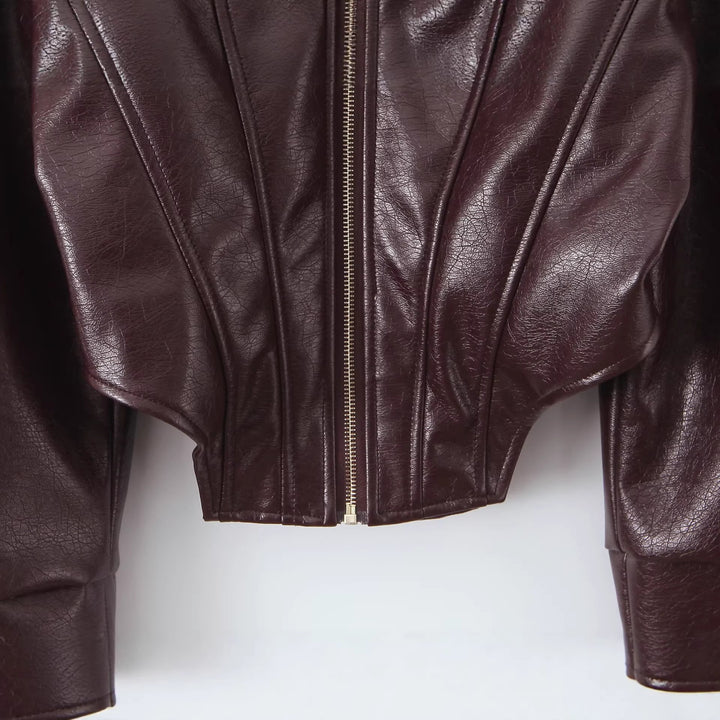 Women's cropped leather jacket with fitted corset look, shoulder epaulets and zipper Mune Fashion