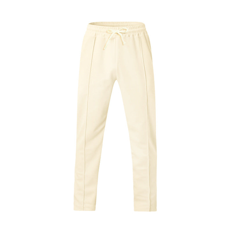Men's sporty joggers with elastic waistband and front center seam Mune Fashion