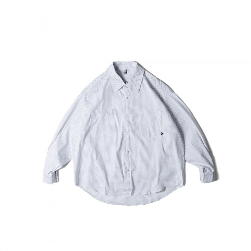 Unisex Oversize-checkered Shirt with rounded hem and appliquéd chest pockets Mune Fashion