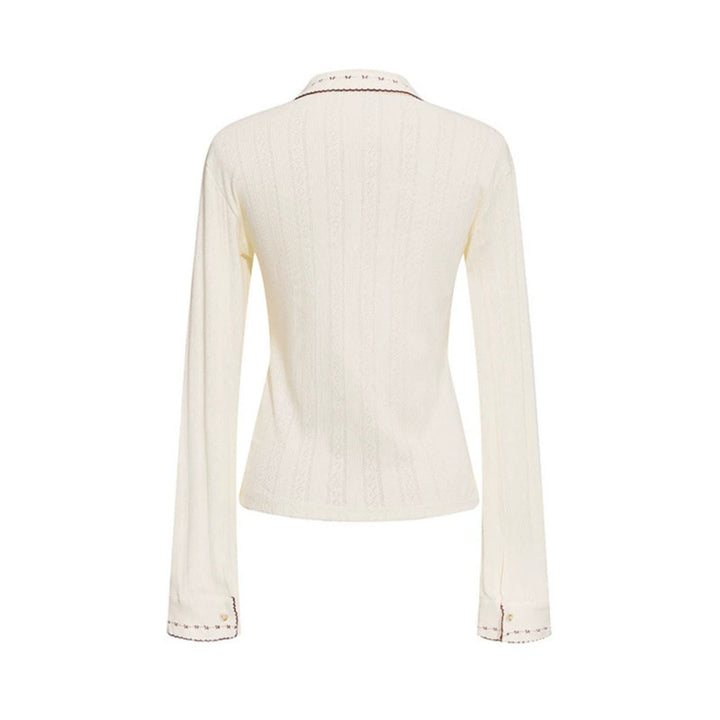 Ladies fine ribbed polo shirt with pointed collar, button placket and decorative embroidery Mune Fashion