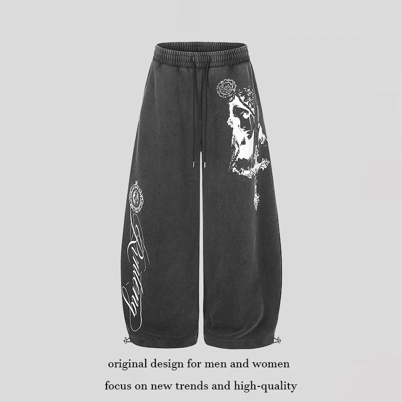 Women's extra-wide palazzo harem pants made of sweatshirt fabric with a high comfort waistband, drawstring, and large graphic print Mune Fashion