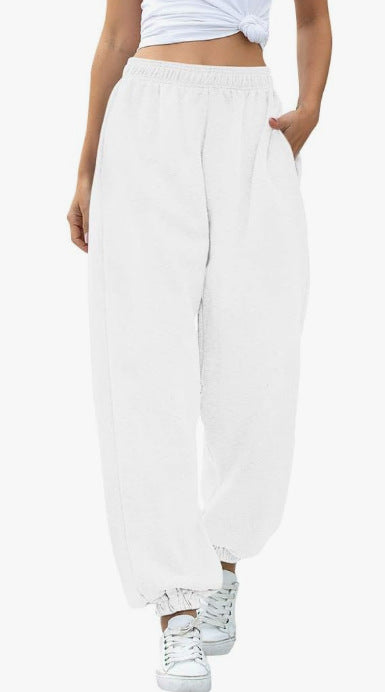 Women's wide High-Waist jogging pants made of soft fleece with elastic waistband, side pockets, and narrow cuffs Mune Fashion