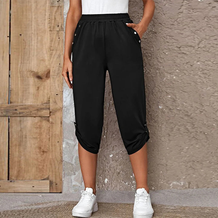 Women's casual three-quarter length pants with elastic waistband, side pockets and roll-up hem Mune Fashion