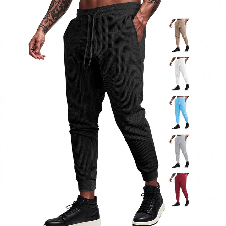 Men's fine-structured jersey lounge pants tapered cut with drawstring waistband and ribbed leg openings Mune Fashion