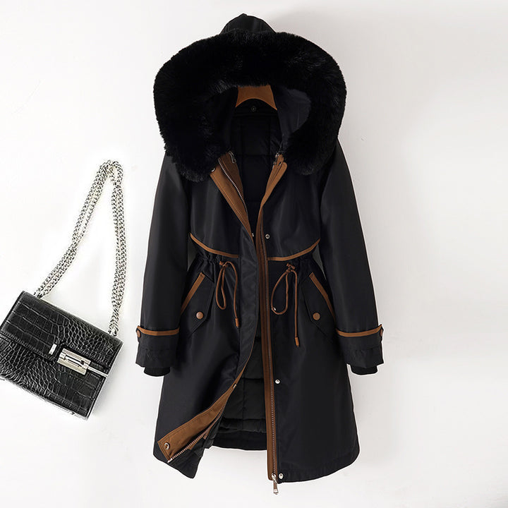 Women's long parka with faux fur hood, waist drawstring, and contrasting piping Mune Fashion