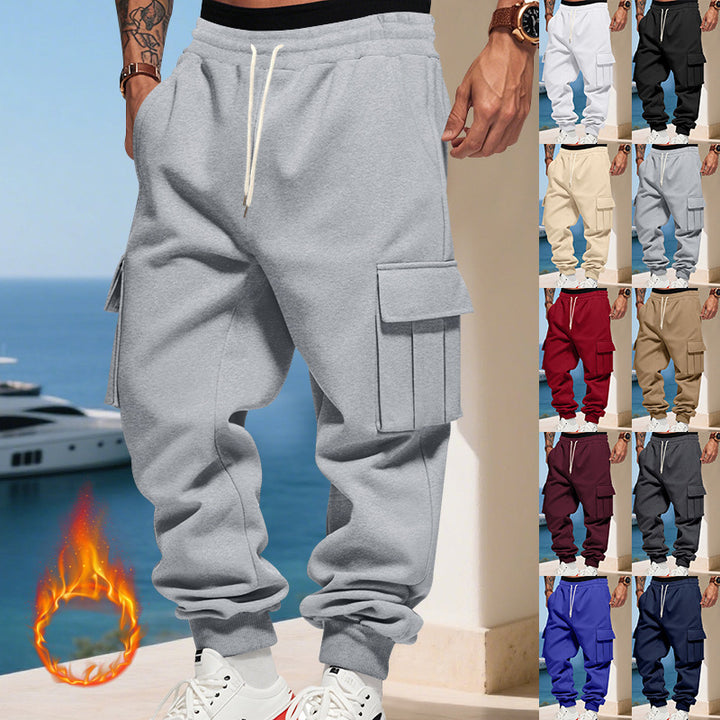 Men's cargo jogging pants with generous flap pockets, elastic waistband, and ribbed cuffs