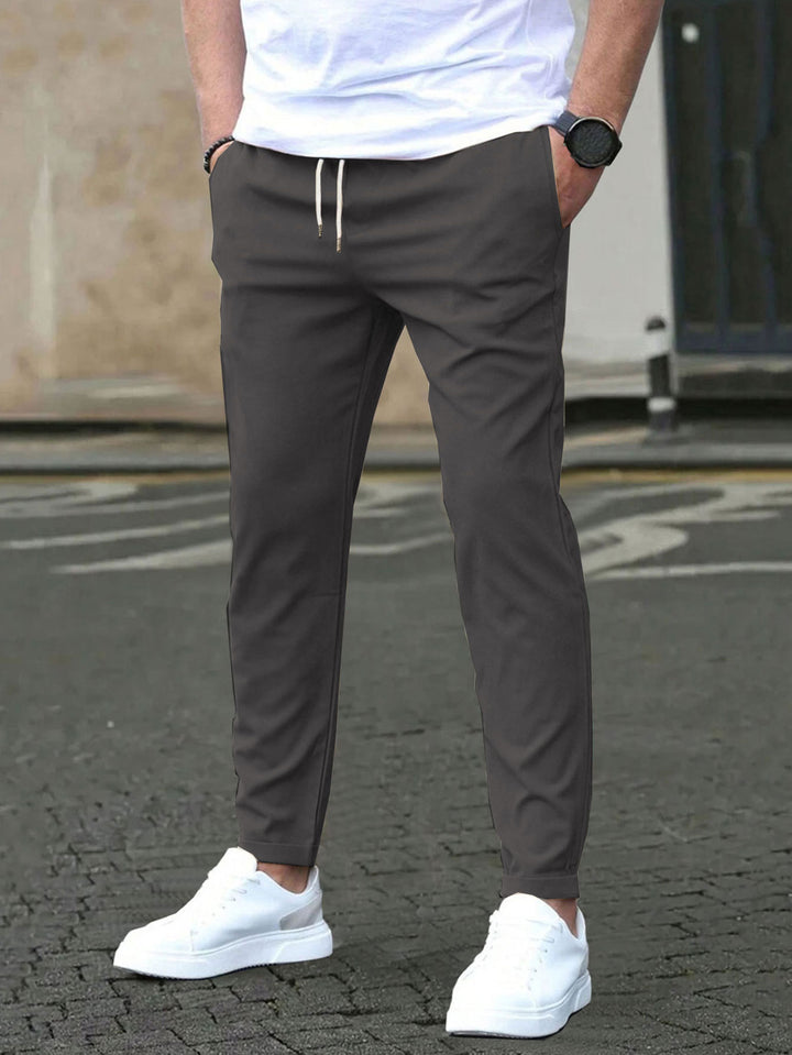 Men's Slim-Fit Jogging Pants with Drawstring, Side Pockets, and Narrow Ankle Hem Mune Fashion