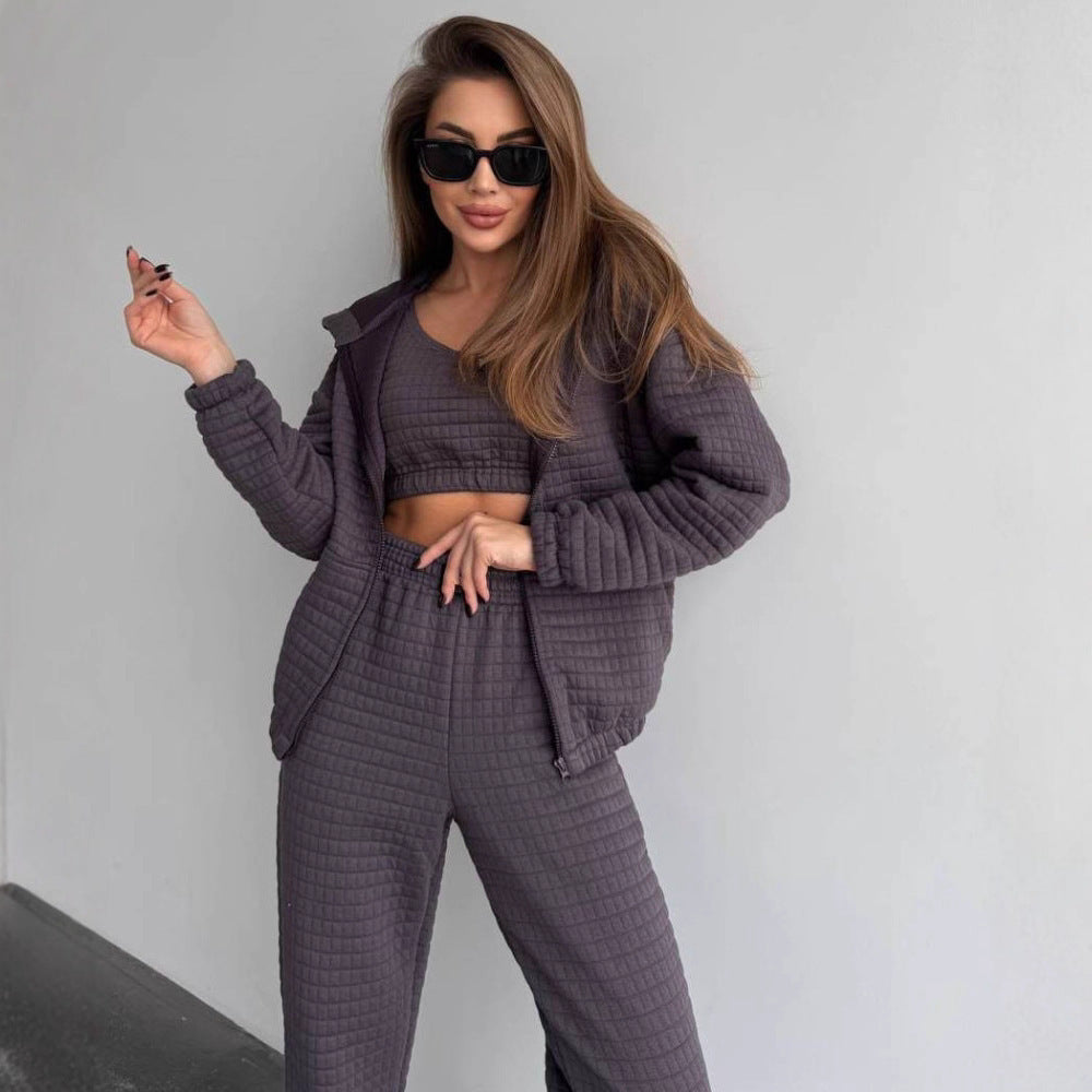 Women's quilted lounge two-piece set made of soft fleece with hooded zip jacket, high-waist pants, and bustier top Mune Fashion