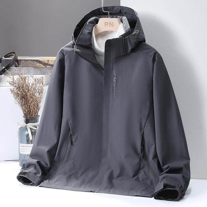 Women's Lightweight Softshell Hooded Jacket with Windproof Storm Flap and Concealed Zipper Pockets Mune Fashion