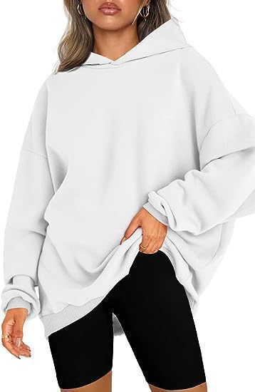 Women's oversized hoodie in longline cut with raglan sleeves and soft inner lining Mune Fashion