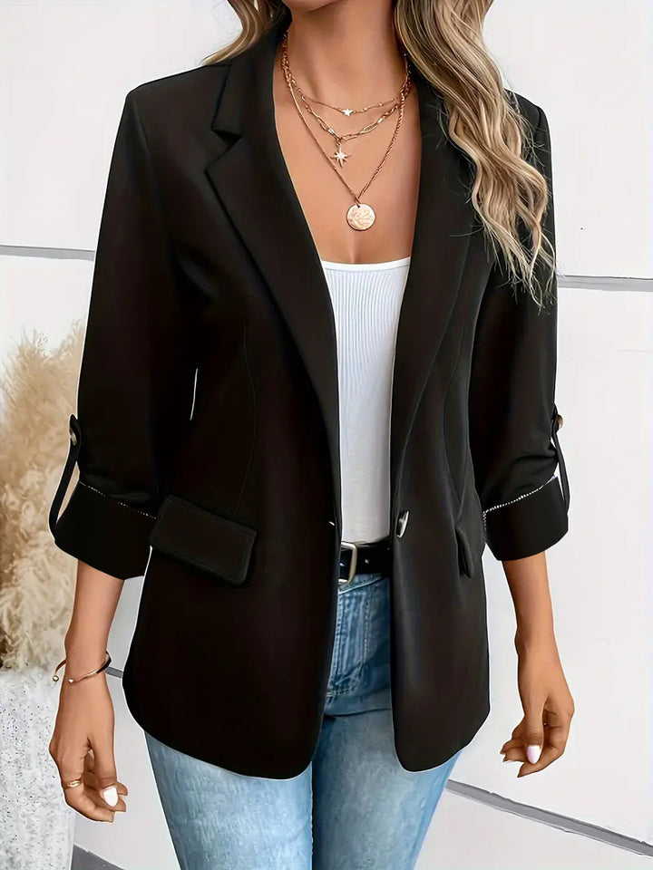Women's tailored business blazer with cap sleeves, turned-up cuffs, and decorative buttons Mune Fashion