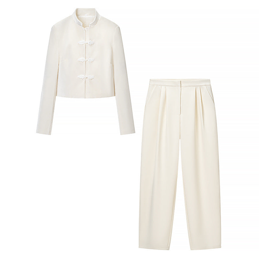 Women's tailored short Mandarin jacket with stand-up collar and decorative knot fastenings Mune Fashion