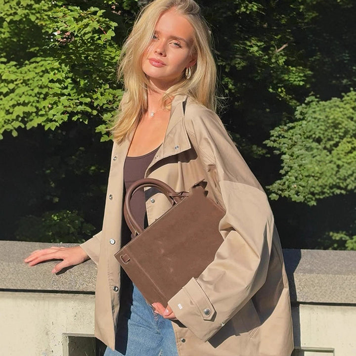 Women's oversized short coat in trench look with boxy silhouette and concealed snap button placket Mune Fashion