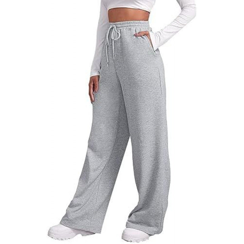 Women's flowing high-waist palazzo lounge pants made of lightweight jersey with elastic waistband and practical side pockets Mune Fashion