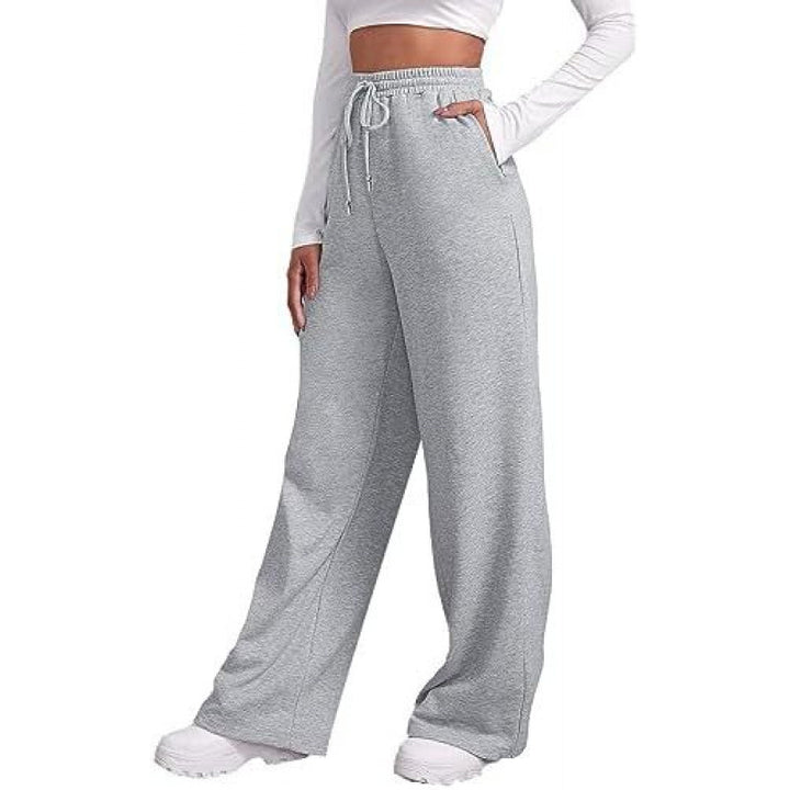 Women's flowing high-waist palazzo lounge pants made of lightweight jersey with elastic waistband and practical side pockets Mune Fashion