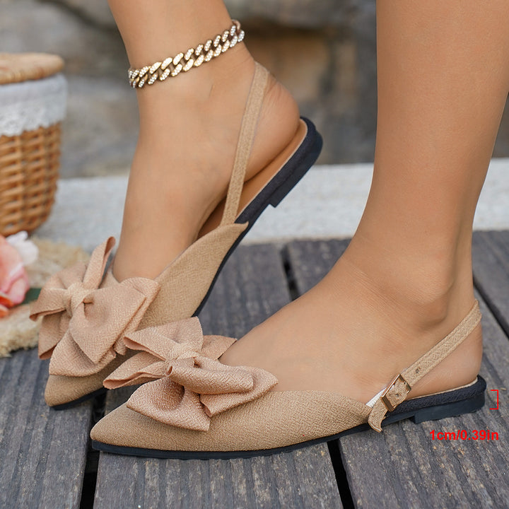 Ladies pointed toe slingback ballerinas with large fabric bow and flat rubber sole Mune Fashion