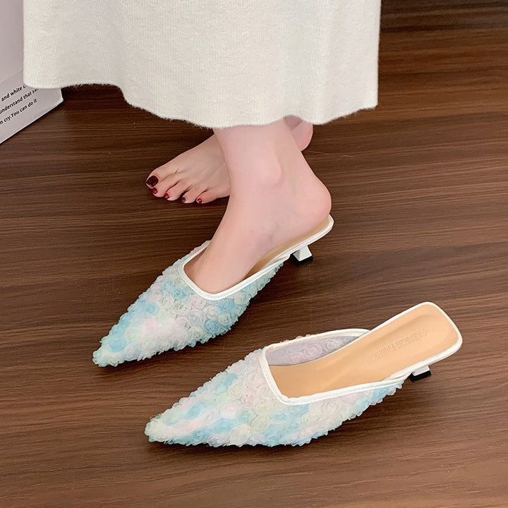 Women's pointed toe mesh mules with three-dimensional floral appliqués and padded comfort footbed Mune Fashion