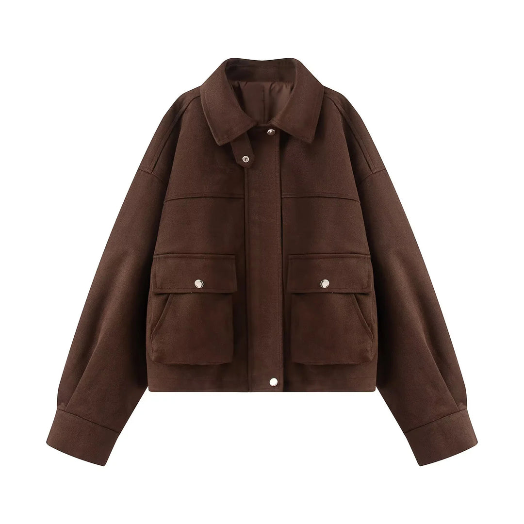 Women's boxy short utility jacket with large flap pockets, snap button placket, and drop shoulder Mune Fashion