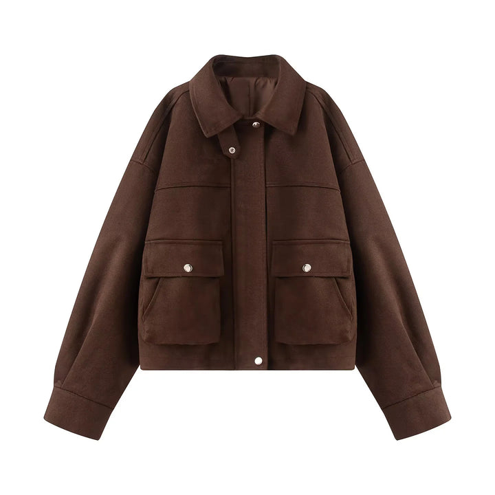 Women's boxy short utility jacket with large flap pockets, snap button placket, and drop shoulder Mune Fashion