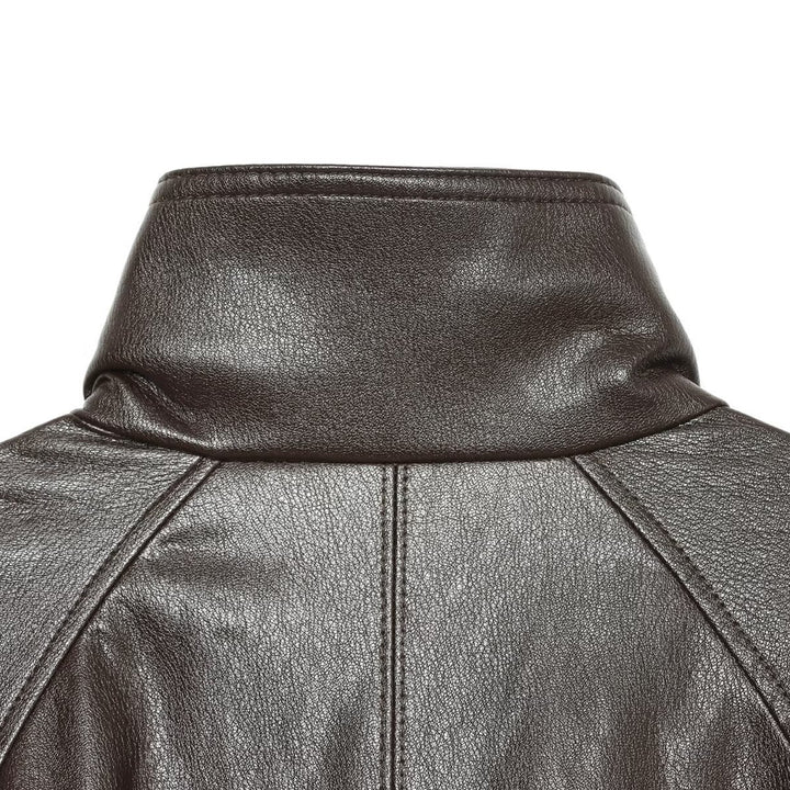 Women's short-cut leather look blouson jacket with high funnel collar, shoulder tabs and integrated patch pockets Mune Fashion