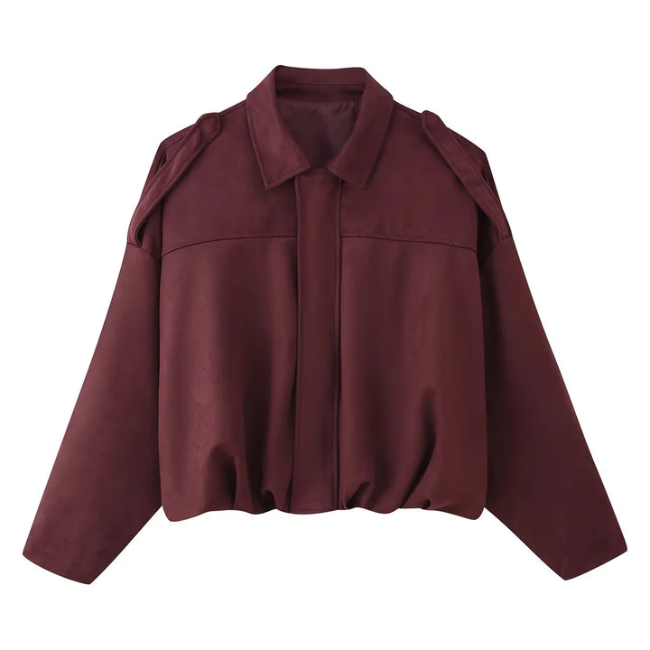 Ladies short cut oversized blouson jacket with shoulder epaulettes, concealed front placket and elastic cord hem Mune Fashion