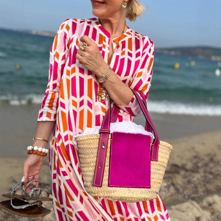 Women's flowing maxi dress with graphic all-over print, V-neck and three-quarter sleeves Mune Fashion