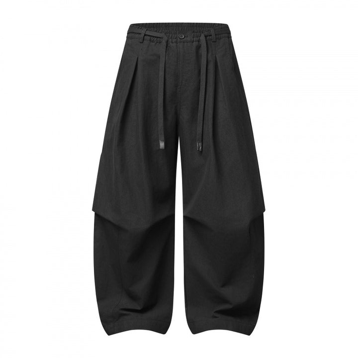 Unisex wide layered pants with balloon-shaped silhouette, high waist and drawstring Mune Fashion